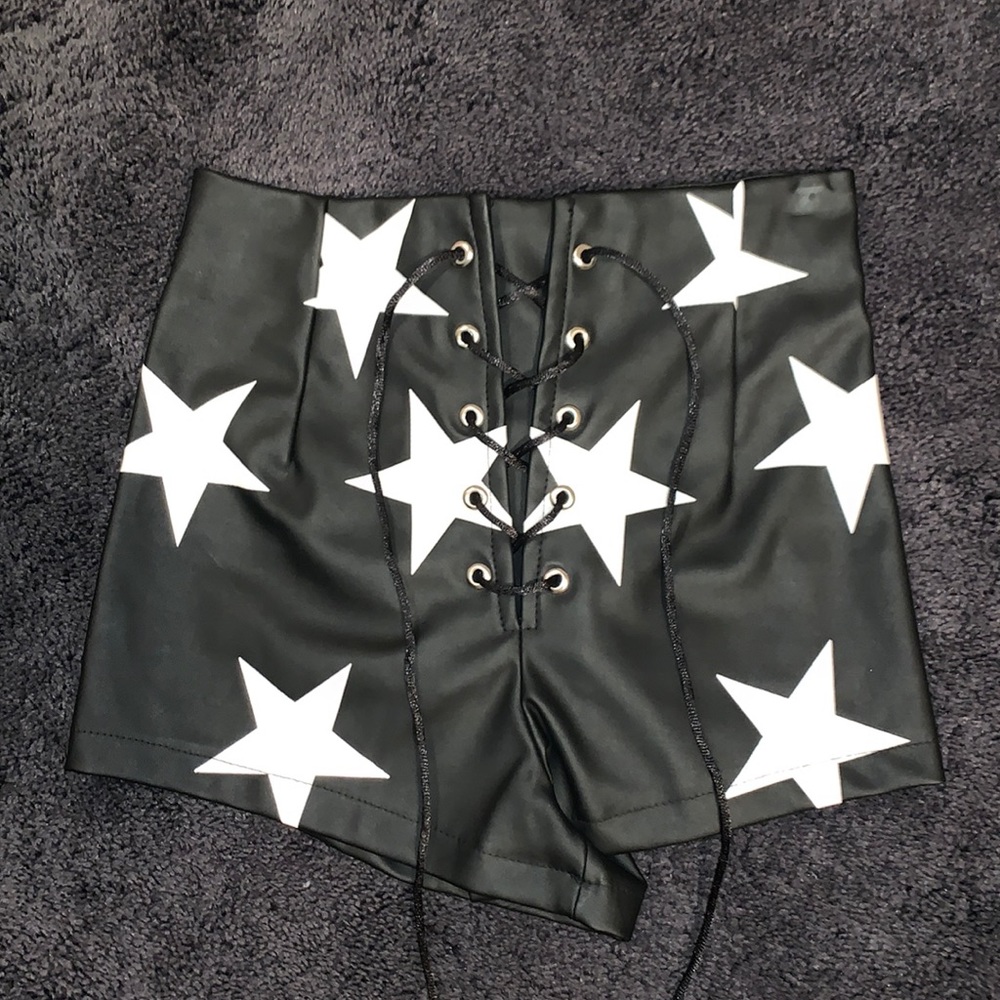 BLACK FAUX LEATHER LACE UP SHORTS WITH WHITE STARS